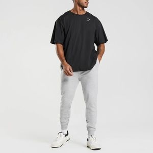 NEW Gymshark Crest Joggers in Light Grey Marl, size Medium